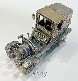 1910 Renault Marne Taxi in Sterling Silver Die Cast Model Car By Franklin Mint 1910 Renault Marne Taxi in Sterling Silver Die Cast Model Car By Franklin Mint