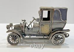 1910 Renault Marne Taxi in Sterling Silver Die Cast Model Car By Franklin Mint 1910 Renault Marne Taxi in Sterling Silver Die Cast Model Car By Franklin Mint