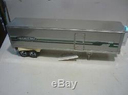 A Franklin Mint scale model of a 1979 Freightliner & trailer, papers, all boxed