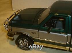 A Franklin mint of a scale model of a 1996 Ford F150 Pick up truck, boxed