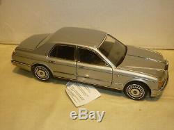 A Franklin mint of a scale model of a 1998 Rolls Royce Silver Seraph. Boxed