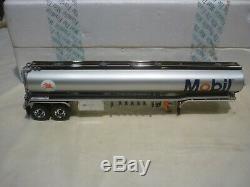 A Franklin mint of a scale model of a MACK CH600 Tractor, tanker trailer, boxed