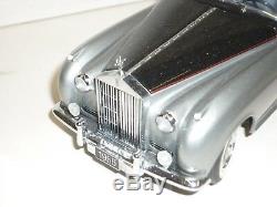 A Franklin mint scale model car of a 1955 Rolls Royce Silver Cloud 1. Boxed