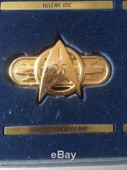 Franklin Mint Official Star Trek Insignia Collection in Silver and Gold