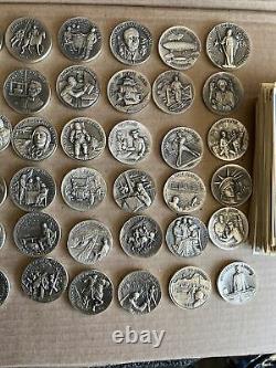 Longines Symphonette Great American Triumphs 60 Coin Sterling Silver Set