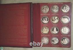 Pair Of Thomason Medallic Bible Medal Sets In Custom Franklin Mint Albums