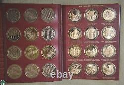 Pair Of Thomason Medallic Bible Medal Sets In Custom Franklin Mint Albums