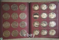 Pair Of Thomason Medallic Bible Medal Sets In Custom Franklin Mint Albums