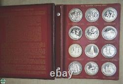 Pair Of Thomason Medallic Bible Medal Sets In Custom Franklin Mint Albums