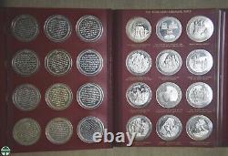 Pair Of Thomason Medallic Bible Medal Sets In Custom Franklin Mint Albums