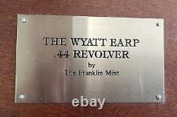 Vintage Wyatt Earp. 44 Revolver from Franklin Mint in Gun display frame